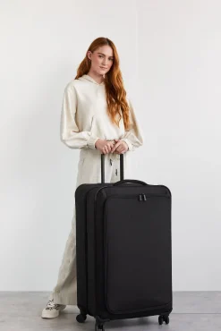 Soft-Sided Collapsible Check-In Roller In Black