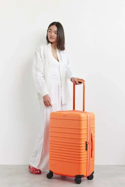 The 26" Check-In Roller In Creamsicle