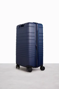 The 26" Check-In Roller In Navy