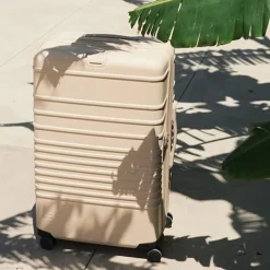 The Carry-On Roller In Beige